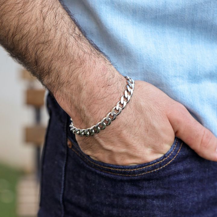 Mens chain bracelets are versatile accessories that can elevate any outfit, adding a touch of style and personality.