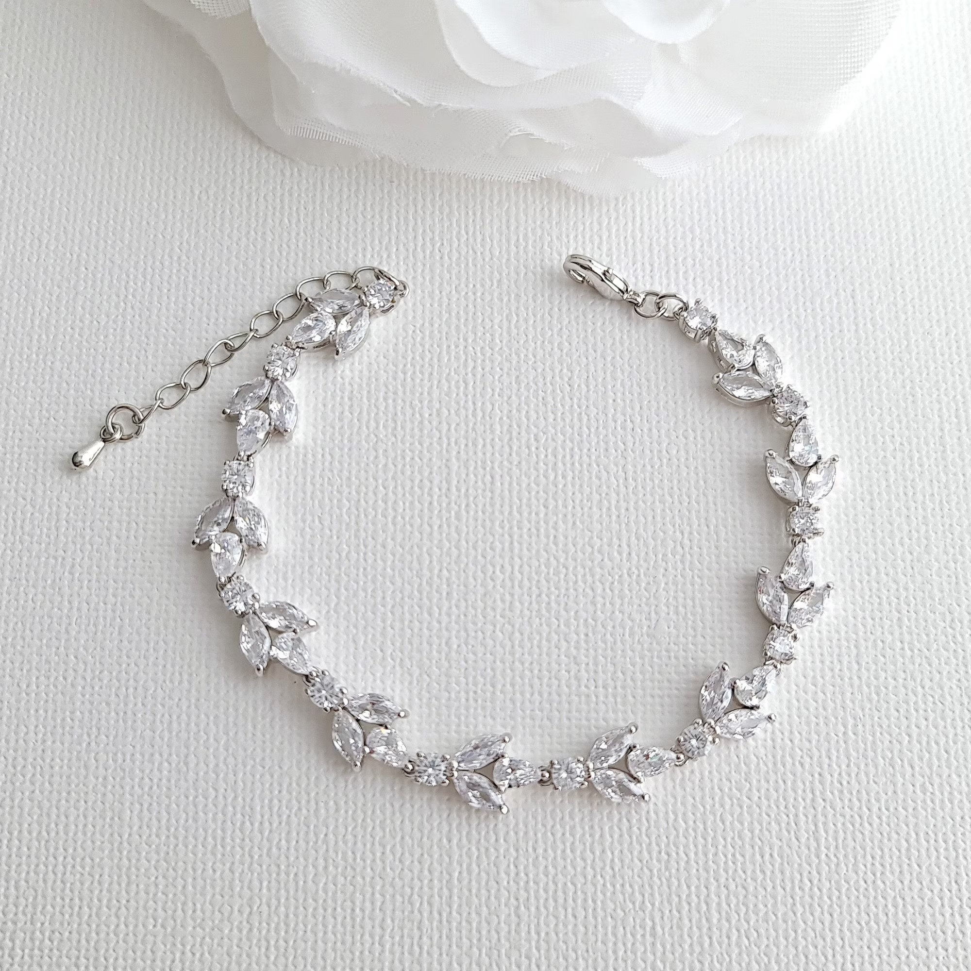 Bridal bracelets are delicate and elegant accessories that can add a touch of glamour and sophistication to a bride's ensemble on her special day.