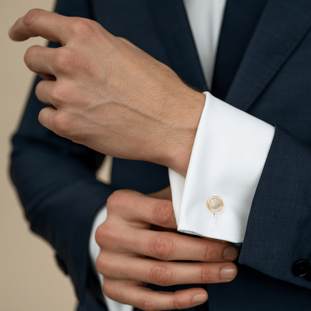 cufflinks on a shirt with buttons